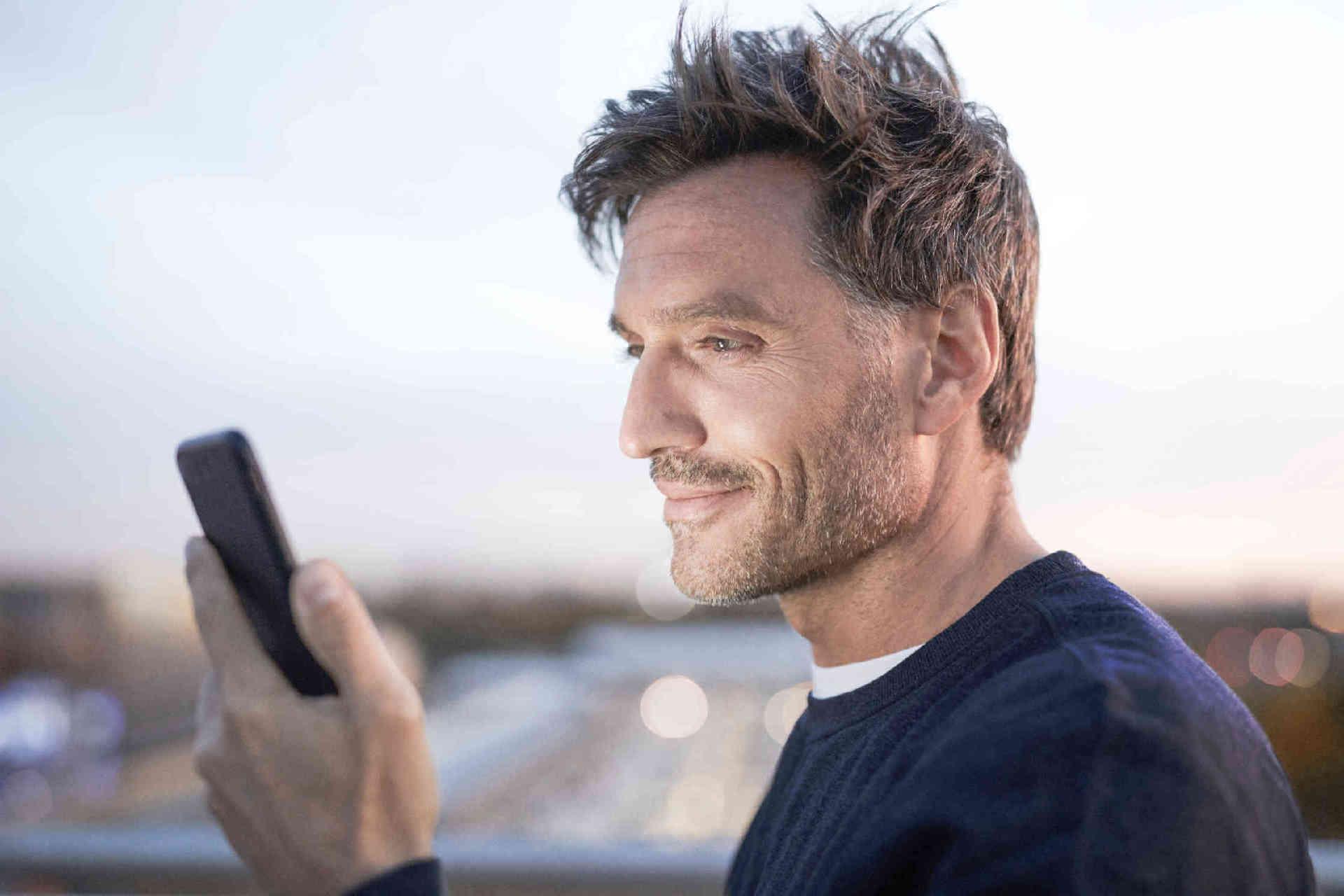 Man looking on a smartphone