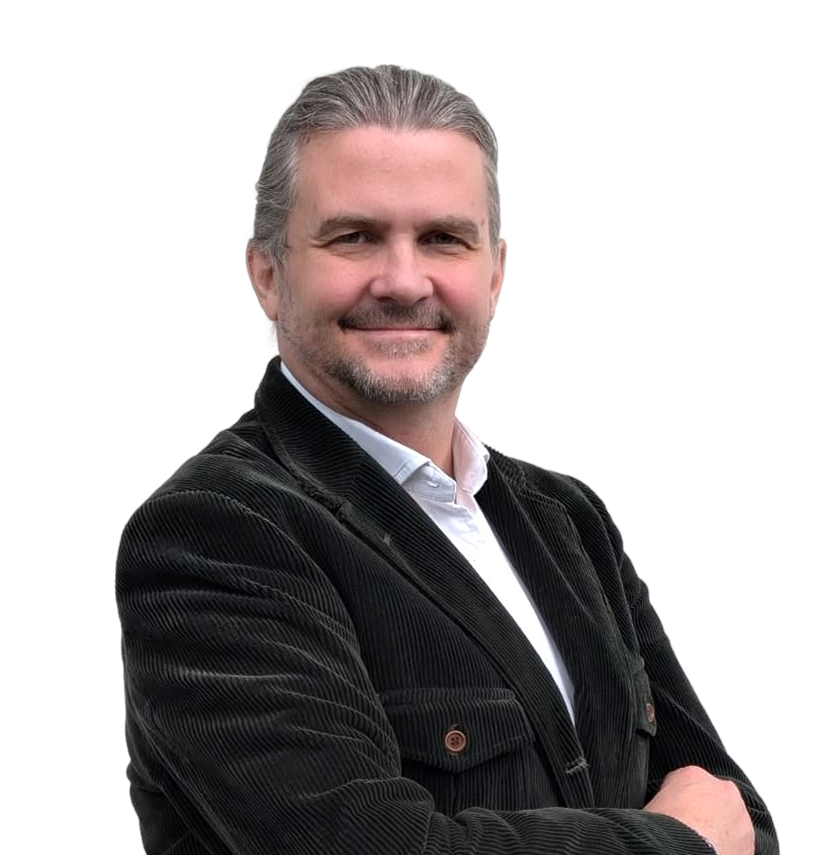 Professional portrait of William Townsend in business attire against a neutral background.